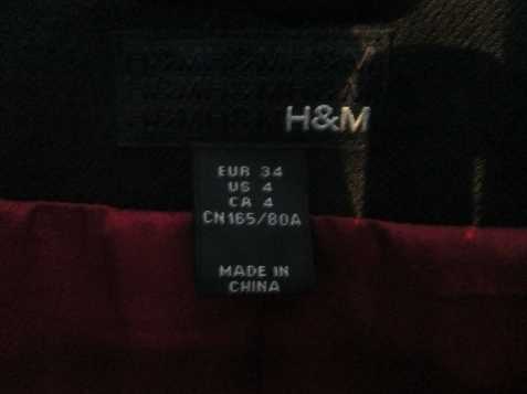 Černý jarní nebo podzimní kabát zn. H&M